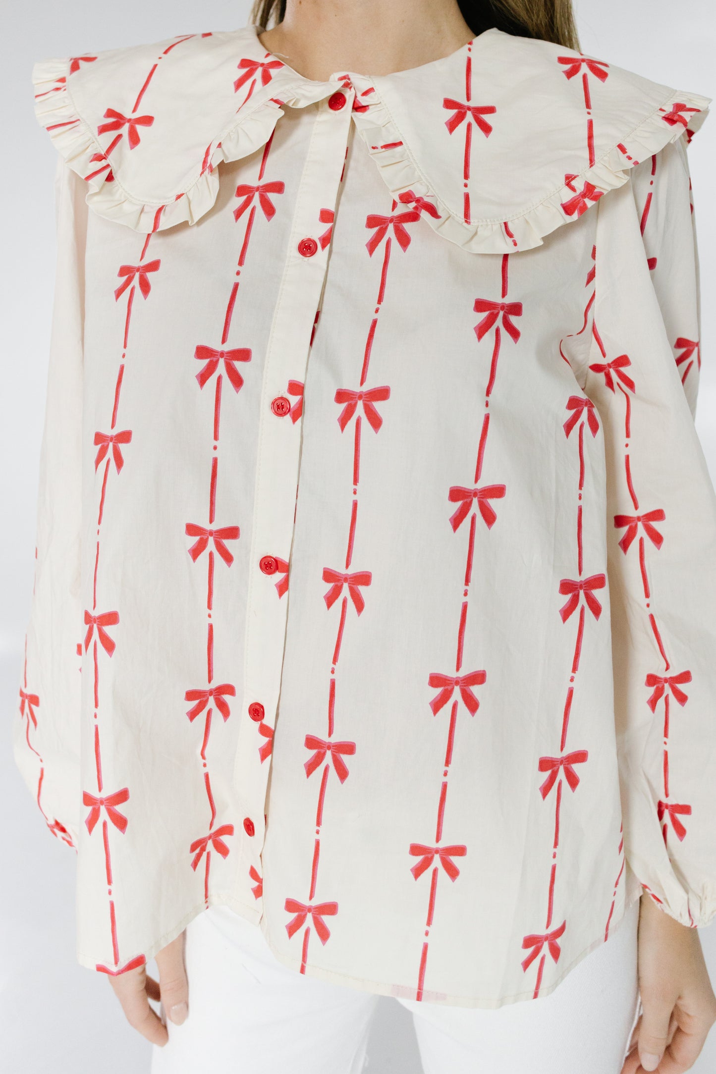 Nolie blouse with red bows